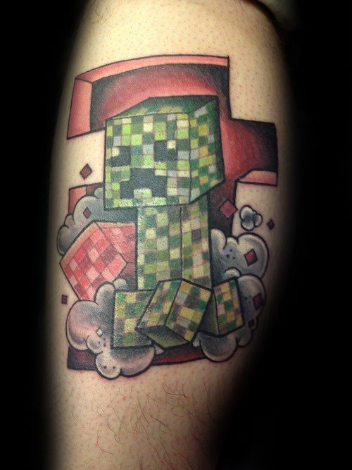 Detailed Minecraft Creeper tattoo surrounded by pixelated blocks and puffs of smoke, with bold shading and a 3D cartoon-style design.