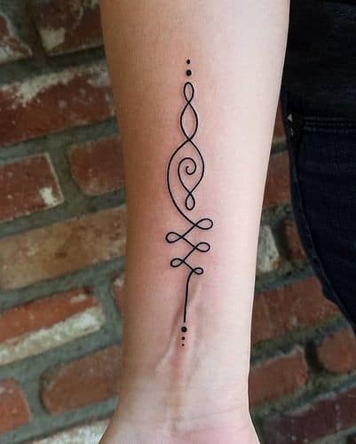 Elegant Unalome tattoo on the forearm, featuring loops, dots, and lines symbolizing personal growth, wisdom, and spiritual enlightenment.
