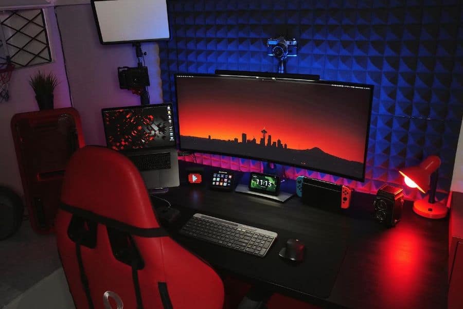 minimalist desk setup soundproof red gaming chair
