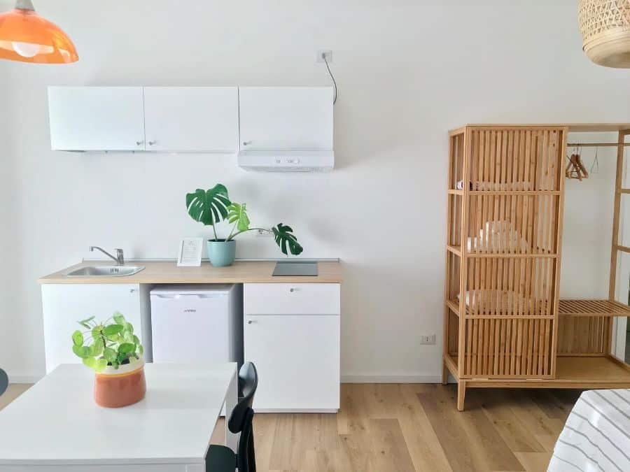 small minimalist kitchenette wood cupboard