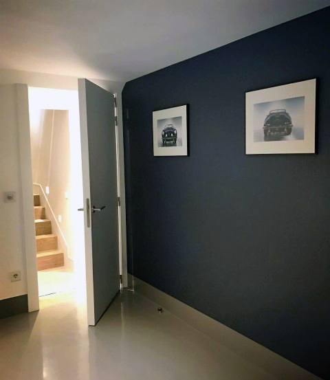 minimalist simple blue painted garage wall