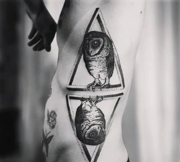 Mirror Image Of Owl In Triangle Tattoo On Ribs For Men