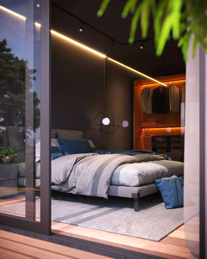 Modern bedroom with sleek design, sliding glass door, and warm closet lighting.