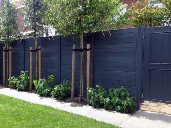 modern black front yard fence with gate