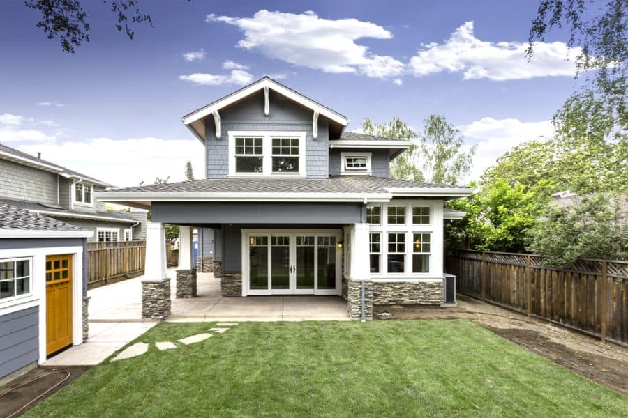 gray modern craftsman style home backyard