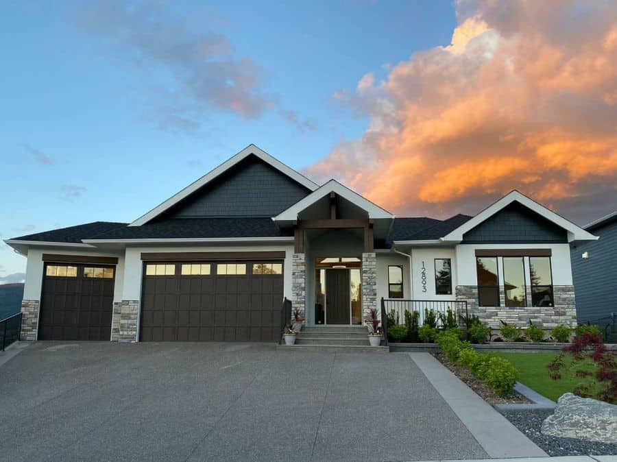 modern craftsman style home brick concrete driveway