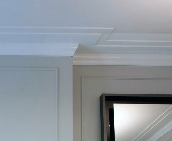 Modern crown molding design with clean lines, adding a sleek and contemporary touch to the room's architecture