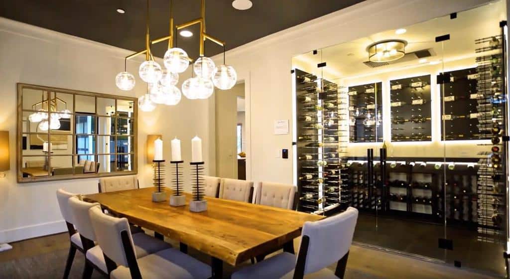 modern dining room wine cellar glass door sputnik chandelier