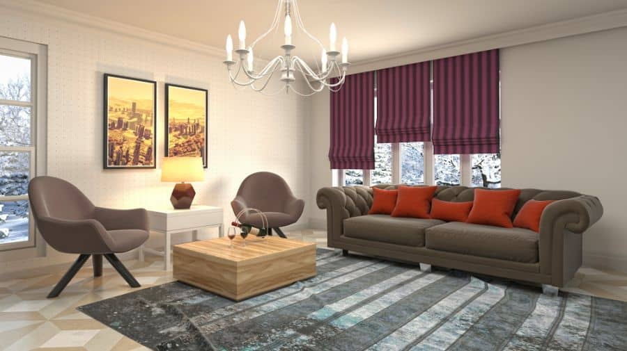 modern living room brown couch wood table pattern floor rug chandelier 