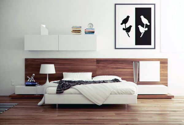 Minimalist bedroom with modern decor, wooden accents, and bird artwork on the wall