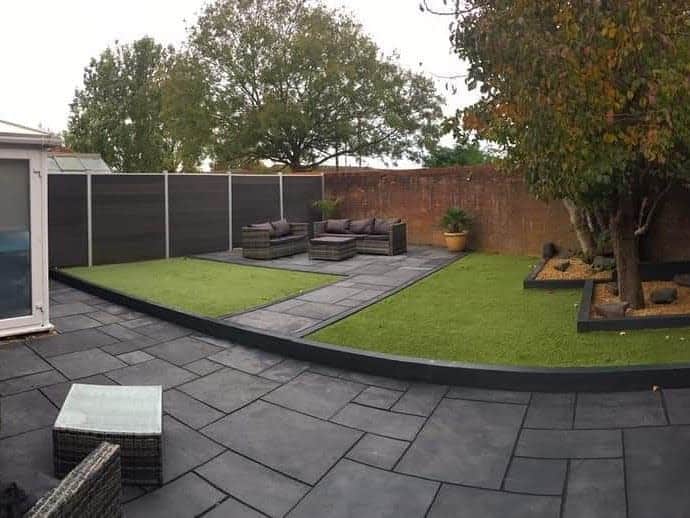 modern garden edging gray pavers wicker furniture