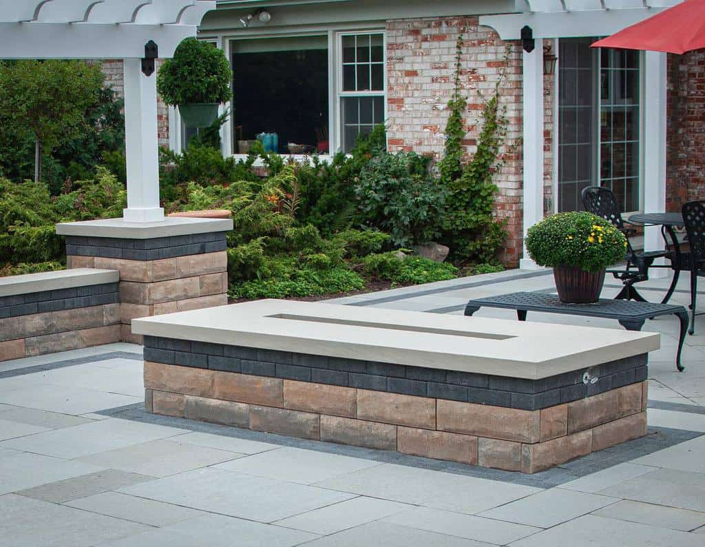 backyard paver patio stone fire pit black garden furniture