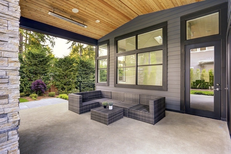 modern home concrete floor with black exterior window trim