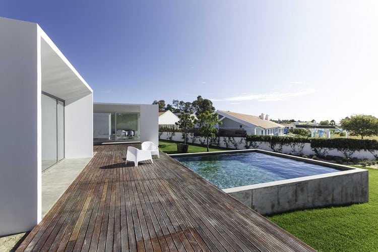 modern house above ground patio pool wooden deck