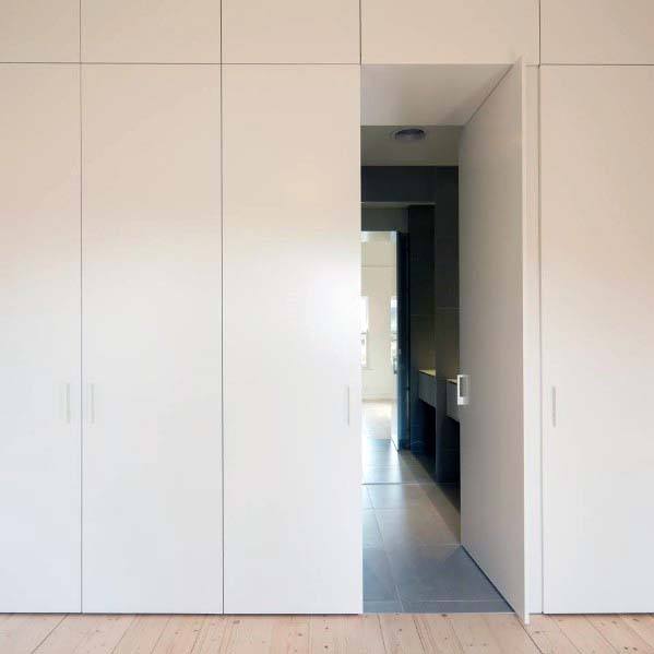 modern white panel hidden door