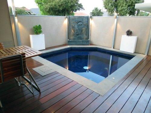 luxury wood deck with large hot tub privacy wall