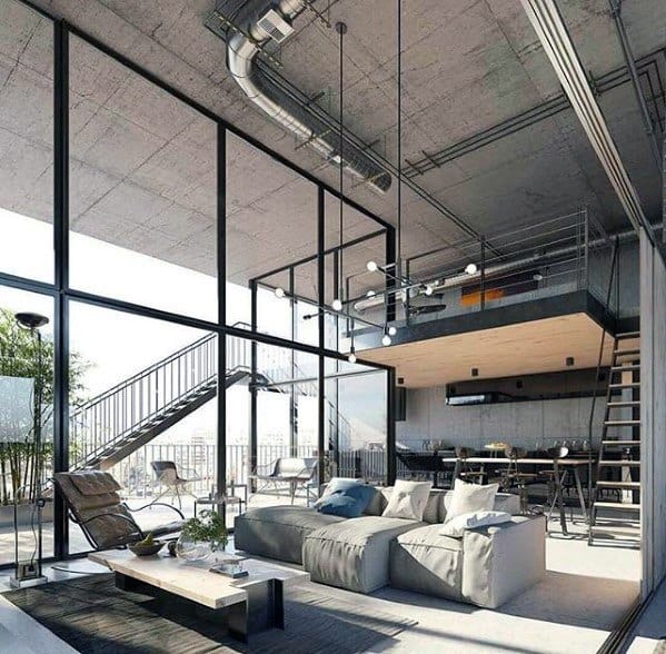 Loft-style living room with industrial design, featuring floor-to-ceiling glass walls, exposed ducts, and a mezzanine level.