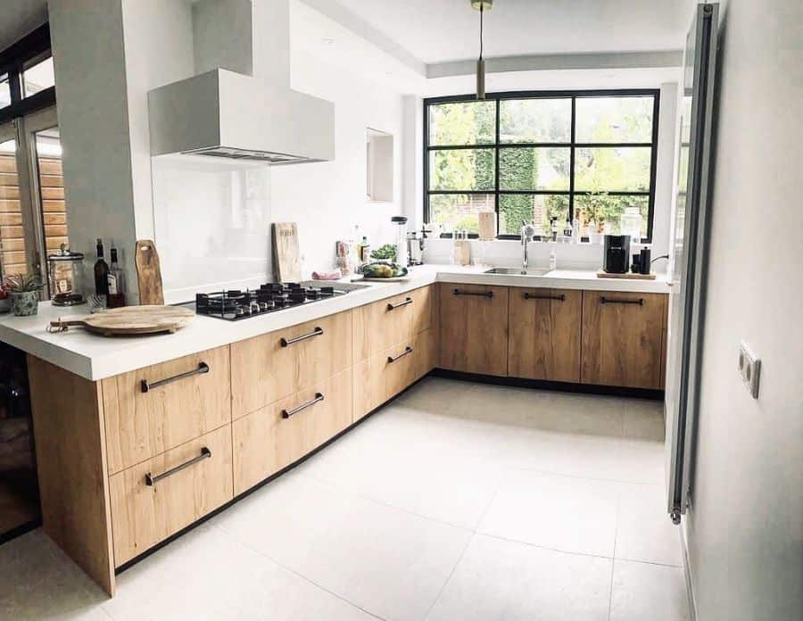 modern kitchen wood cabinets black window treatment tile flooring