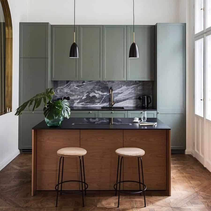 modern green kitchenette wood island black countertop