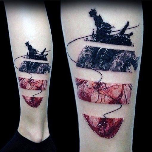 Unique 3D tattoo of an anatomical heart sliced into sections, with a thread connecting the pieces, symbolizing fragility, healing, and resilience.
