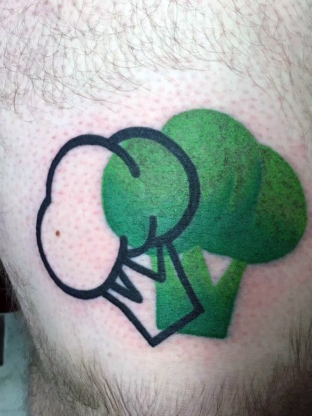 Abstract broccoli tattoo featuring bold black outlines and solid green shading, blending minimalism with a modern artistic twist.