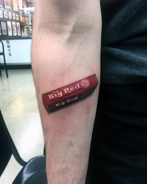 Realistic Big Red gum pack tattoo with detailed shading and highlights, creating a 3D effect that makes it look like it's resting on the skin.