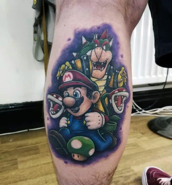 Bold *Super Mario* tattoo featuring Mario holding a Super Mushroom with Bowser looming behind, surrounded by Piranha Plants for a dynamic gaming design.