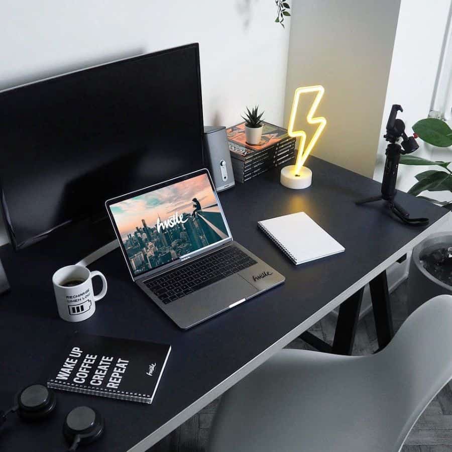 minimalist modern office setup black desk computer gray chair