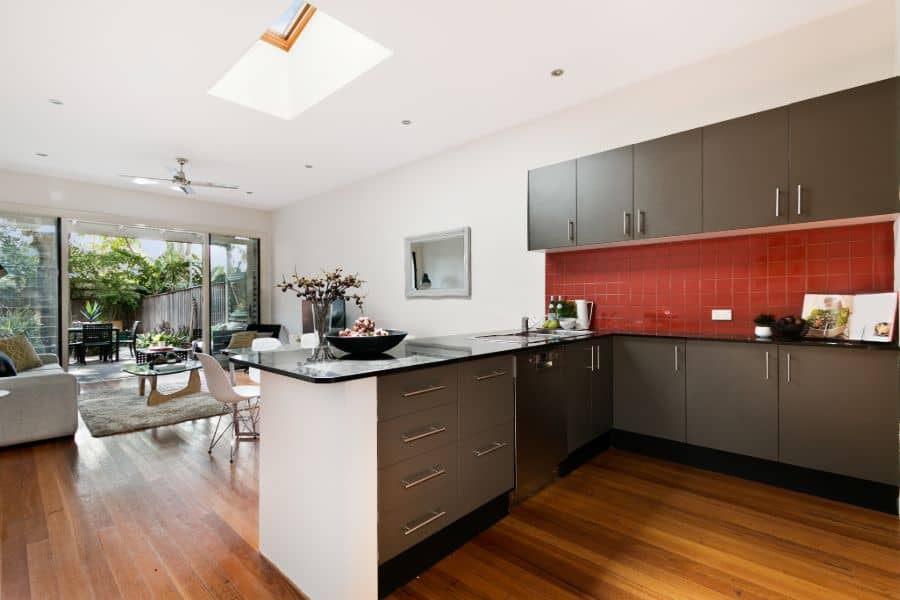 open kitchen and dining room with gray cabinets