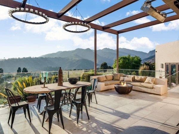 modern patio with glass railings 