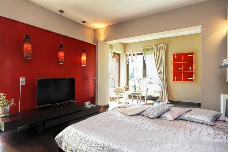 modern red accent wall white bedroom pendant lights tv