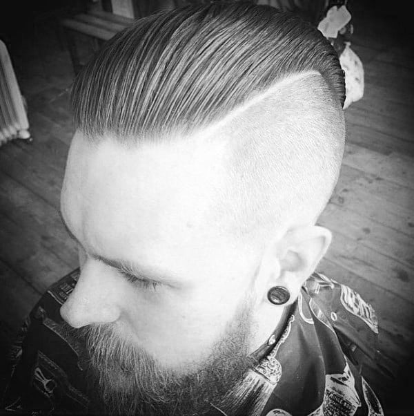 Modern Slicked Back Undercut Haircut For Males With Beards