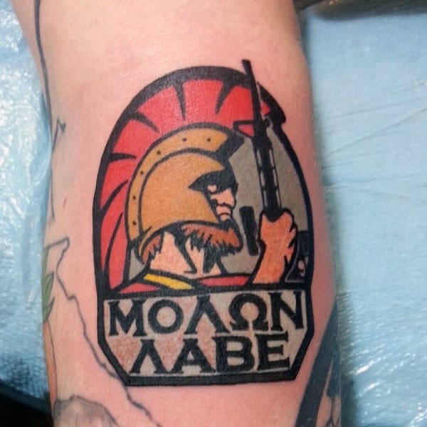 Modern Small Molon Labe Man Holding Rifle Tattoo On Arm