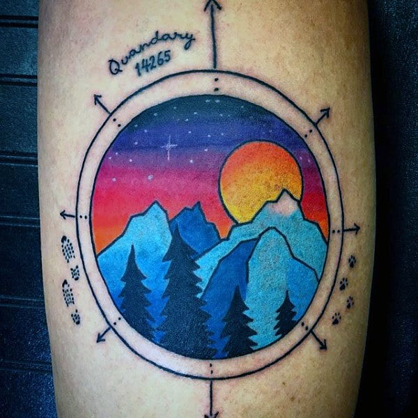 Modern Style Simple Compass And Mountain At Sunset Tattoo On Forearm On Man