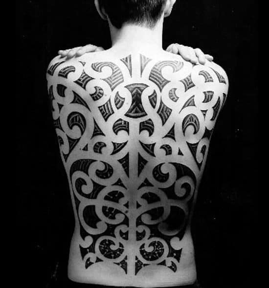 Modern Tribal Mens Back Tattoo Negative Space Design