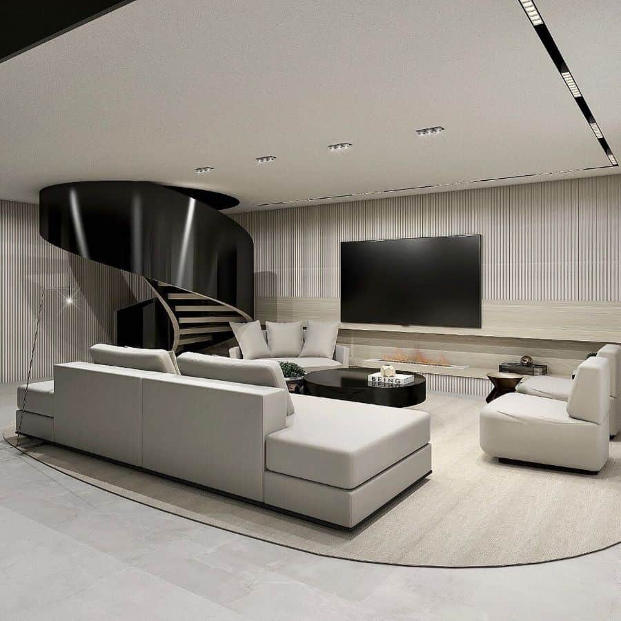 contemporary basement living room with wall mounted tv and gray sofa 