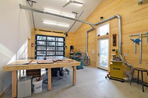 white wall wood panel workshop wood workbench dust collecting system