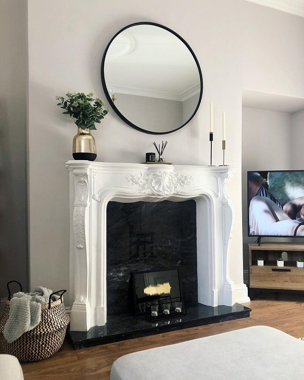 ornate mantel fireplace in living room