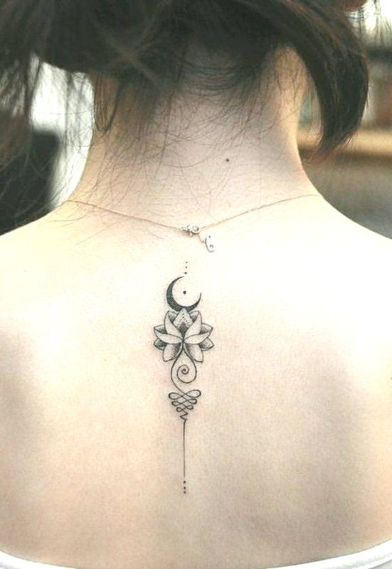Unalome tattoo with a lotus and crescent moon on the upper back, symbolizing spiritual growth, enlightenment, and balance.