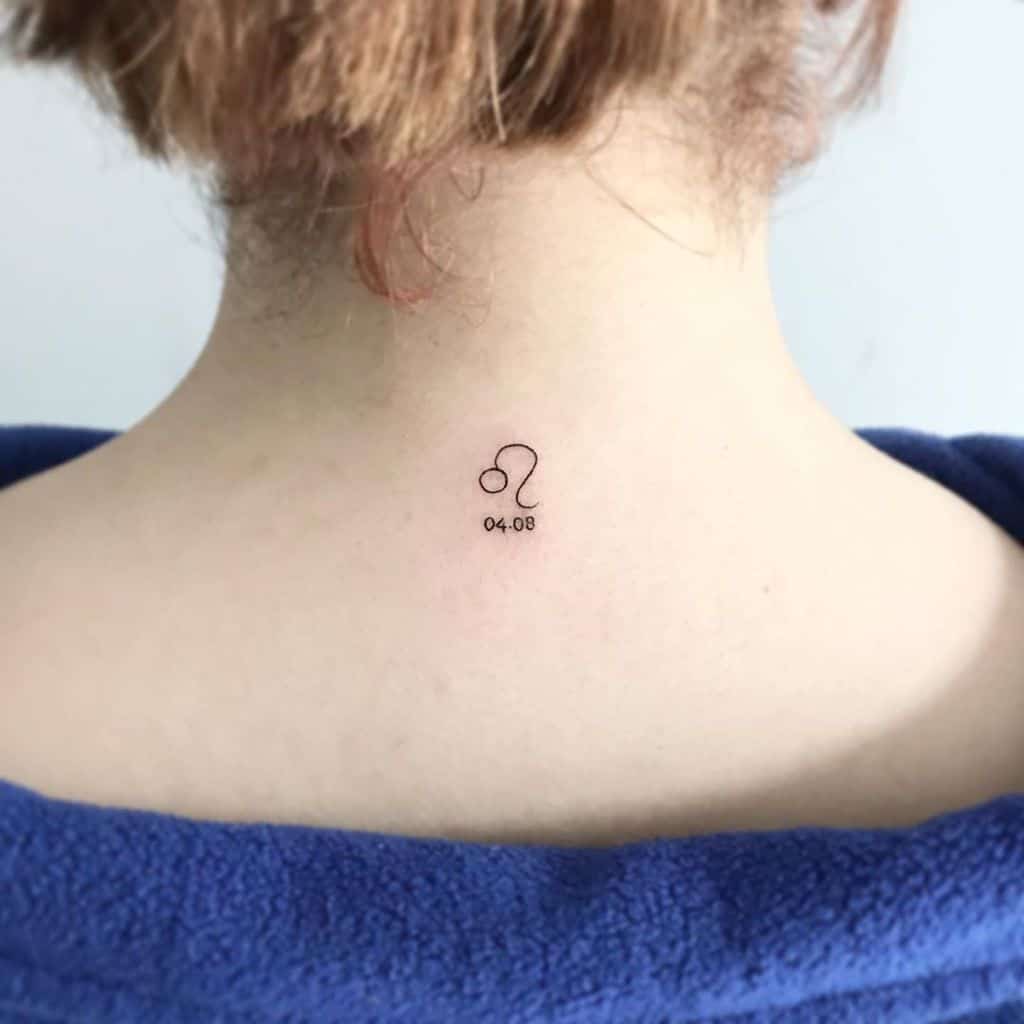 Tiny astrology-inspired Leo tattoo on the nape of the neck, accompanied by a special date.