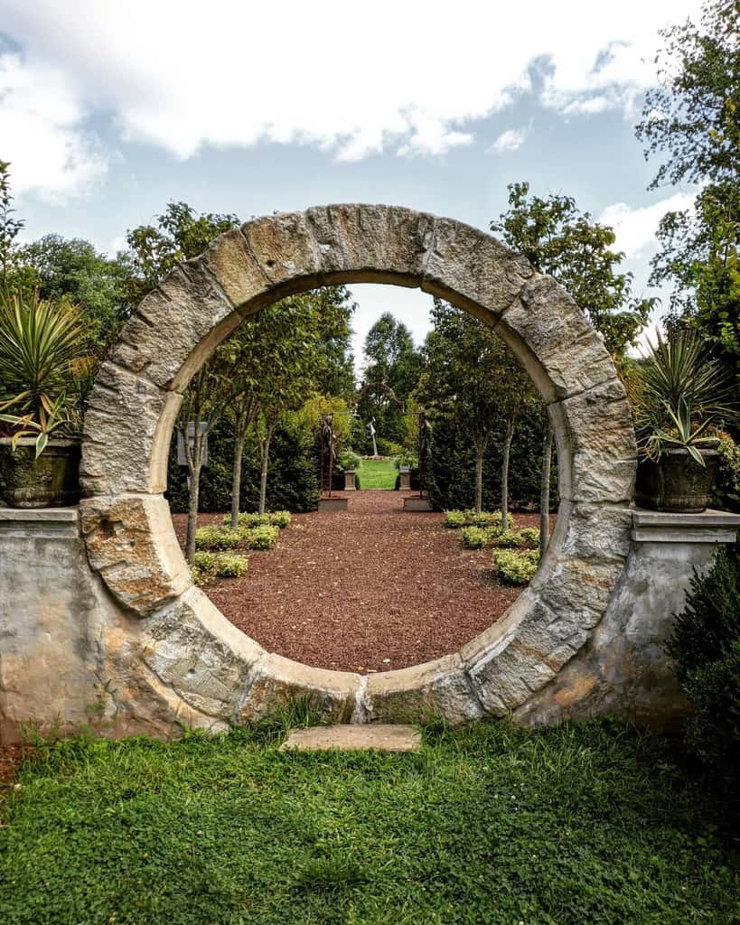 stone moon gate mulch garden