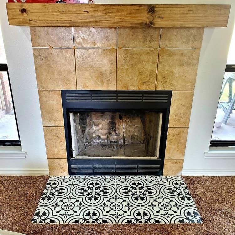 tan tile fireplace surround wood mantel pattern floor tile