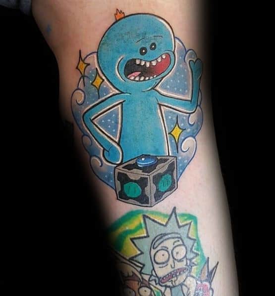 Tattoo of Mr. Meeseeks from Rick and Morty standing behind a Meeseeks Box, surrounded by sparkles and a cloudy blue aura.