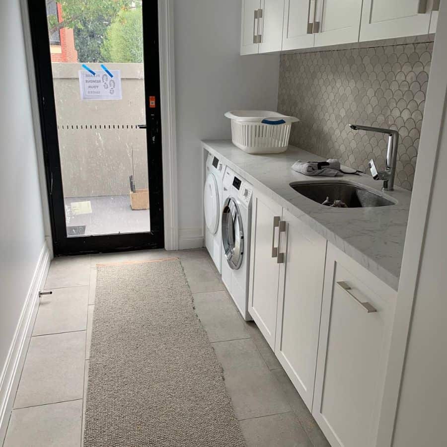 mud room laundry room white cabinets 