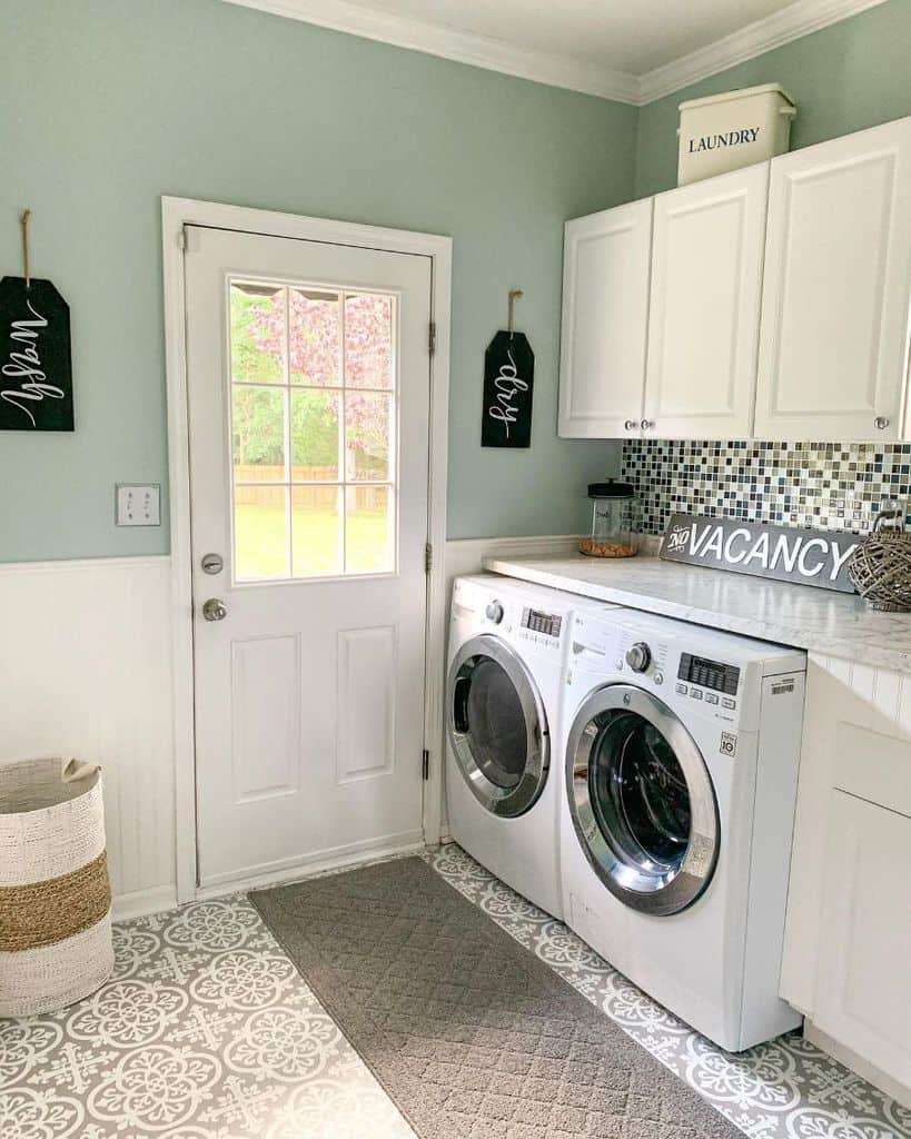 two tone green and white laundry room washer and dryer