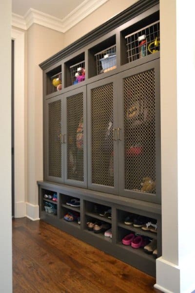mudroom with gray storage cabinets