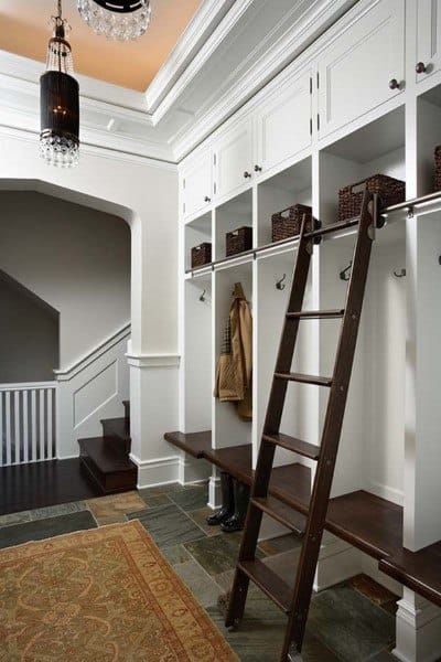 white cabinet mudroom with ladder