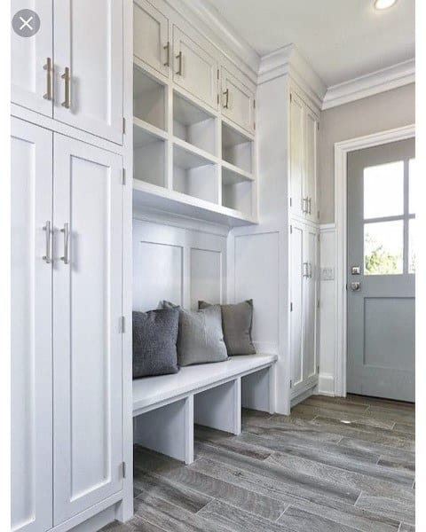 white cabinets in mudroom