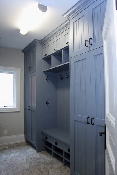 gray cabinets in farmhouse mudroom