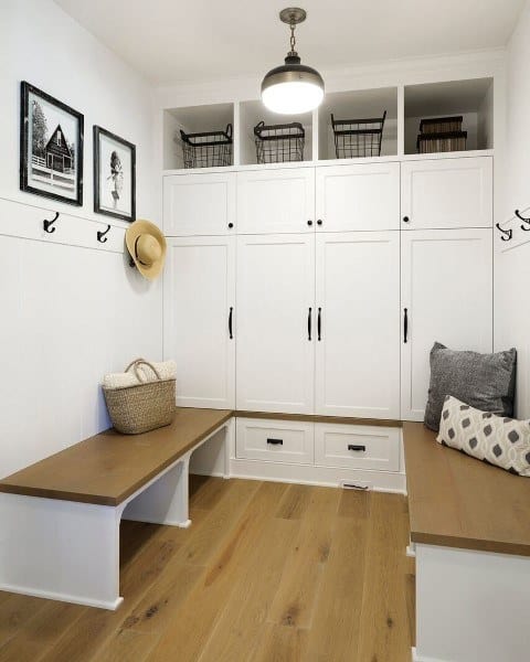 white cabinet mudroom with benches